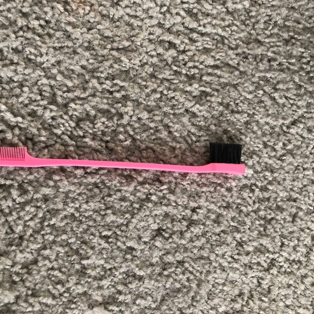 Pink hair brush